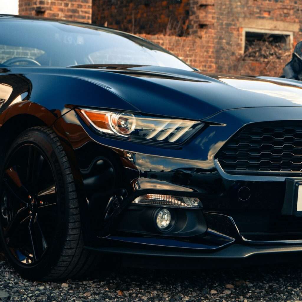 a close up of the front of a black car